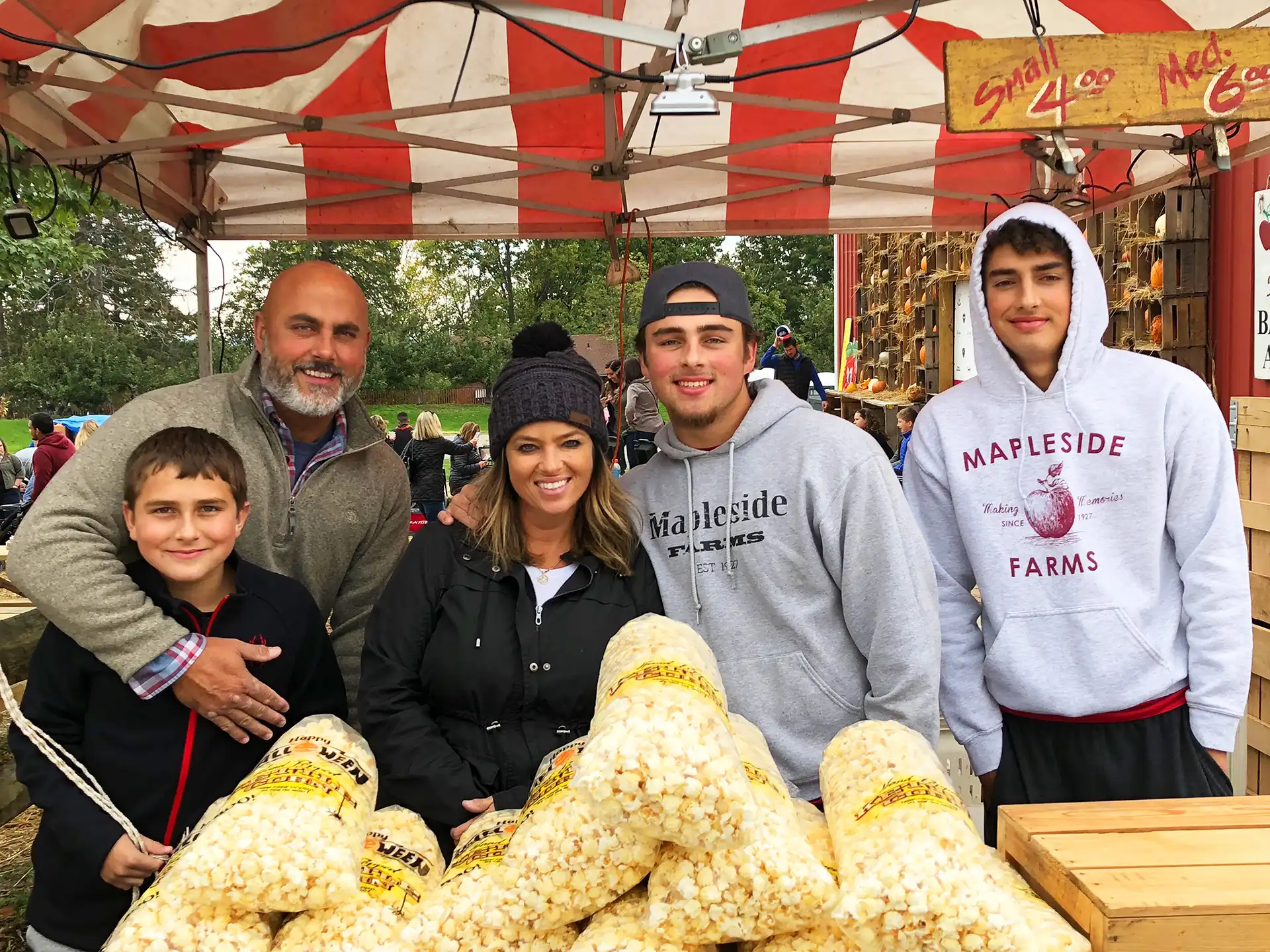 The Clement family at Mapleside Farms in autumn